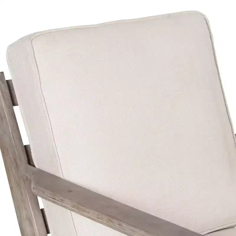 Fauteuil d'appoint artisanal en bois de manguier avec assise coussinée et pieds inclinés